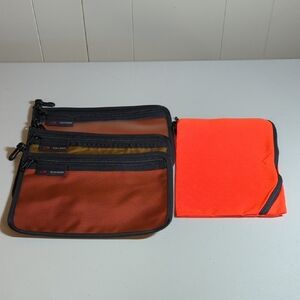 TOM BIHN Orange and Coyote Organizer Pouches